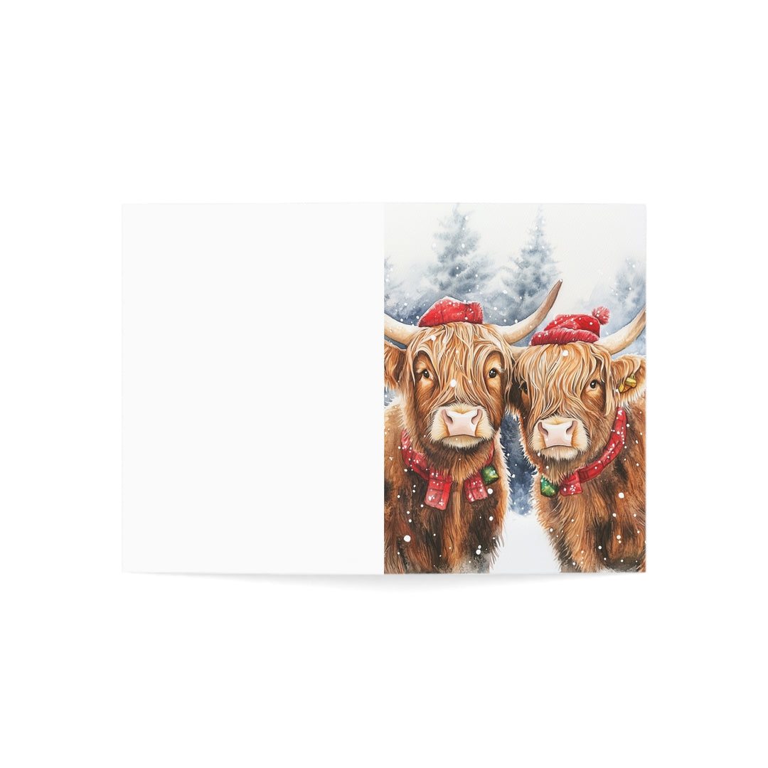 Highland Cow Christmas Card Cute Winter Holiday Greeting with Festive Red Hats & Bells Perfect for Farm Animal Lovers and Seasonal Cheer